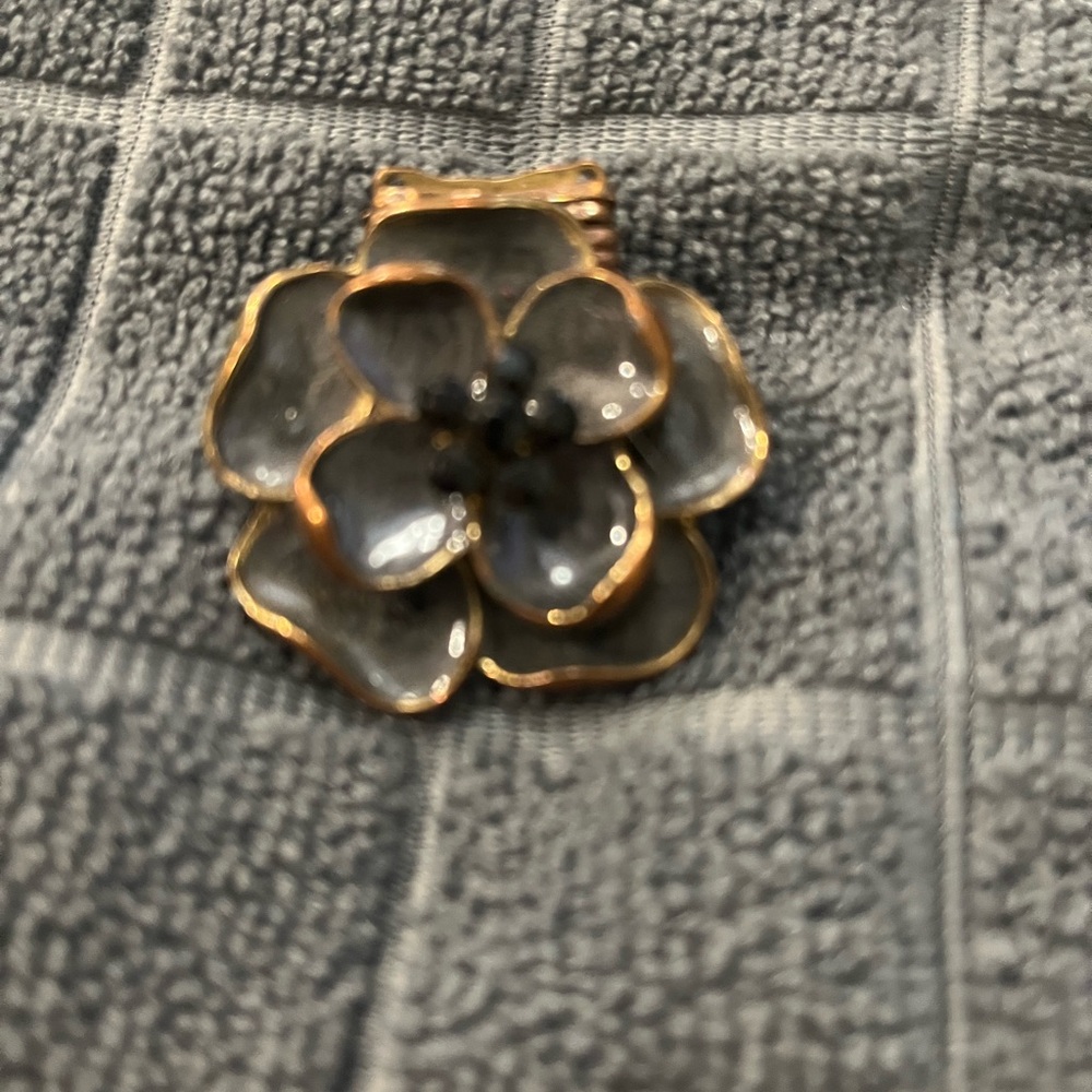 Elegant Gold and Silver Flower Pendant